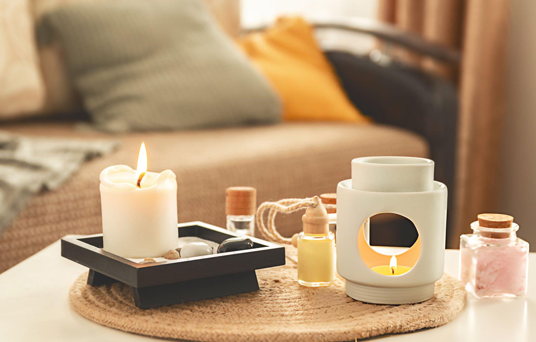 Candles and some perfumes on the table